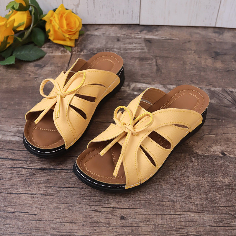 Plus Size Hollow-out Bow Flat Wedge Slippers